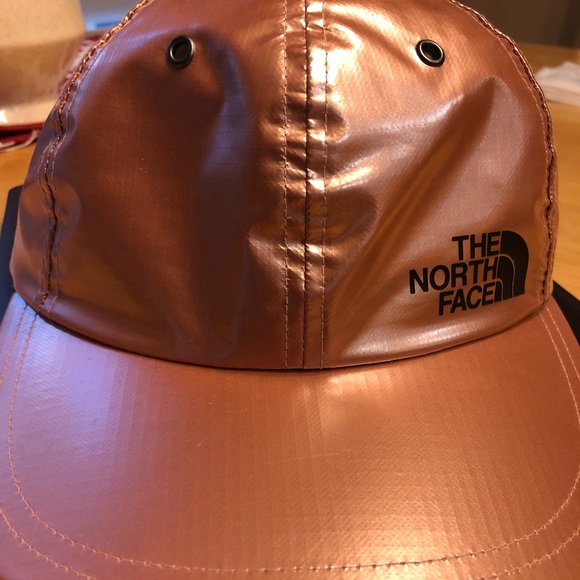 gold supreme hat